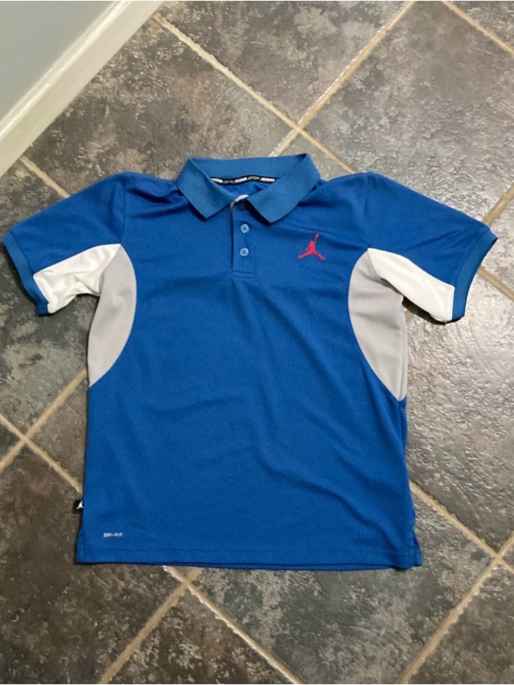 Jordan Blue Polo with White Side Panels and Red Jumpman Boy’s Size L
